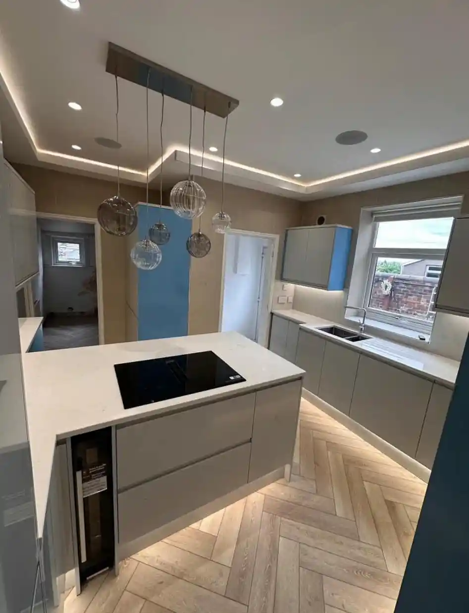 Modern handleless kitchen by Rena Interiors, Stirling